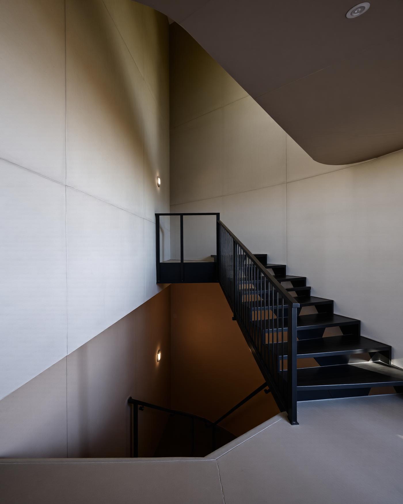 Fitzroy Residence — Blackened steel floating staircase